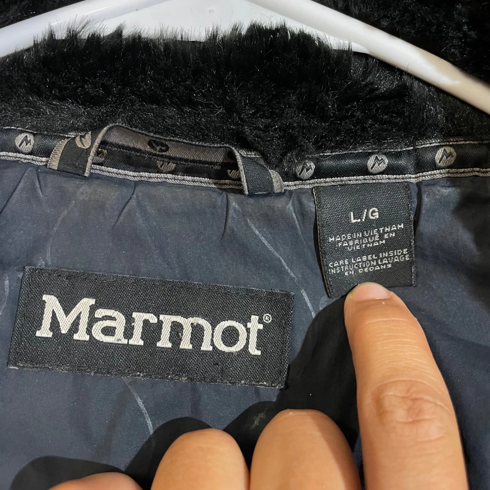 Chaqueta acolchada negra para mujer Marmot cuello de piel sintética talla grande L abrigo cálido de invierno Foto 3 de 4