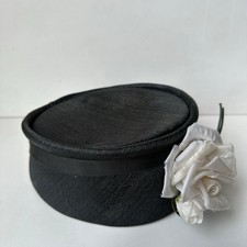 vintage style black cloche/bowler hat with a white rose green foliage accent OS