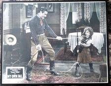 TOM MIX,OLIVE BORDEN IN 