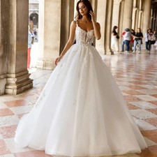 Boho Floral Wedding Dress Sleeveless V Neck Appliques Beaded Beach Bridal Gowns