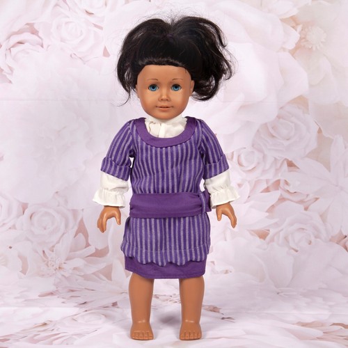 american girl doll with brown hair and blue eyes