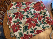 Christmas. table runner. Red with poinsettia designs. 72 inches