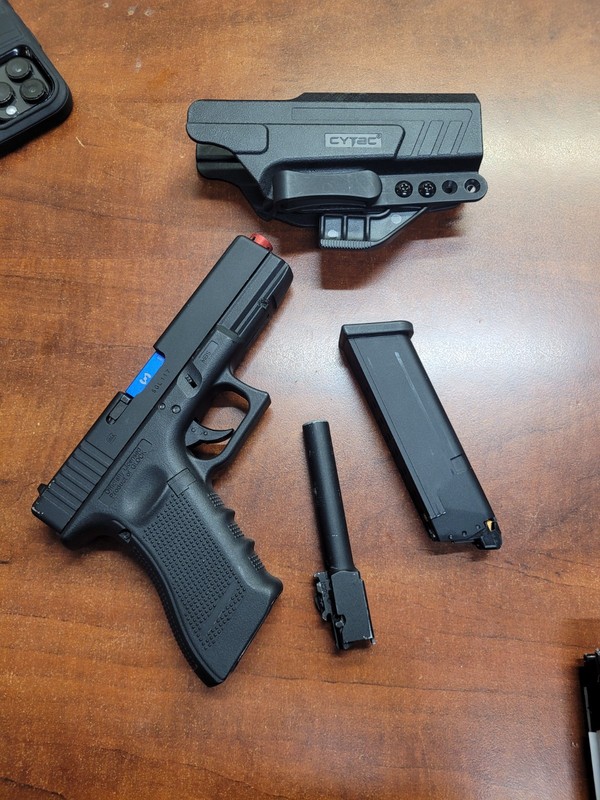 LASER AMMO Recoil Enabled Gas Training Pistol w mag, holster, and airsoft barrel