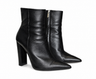 Black leather Gianvito Rossi ankle boots with pointed toes, high heels, and side zippers on a white background.