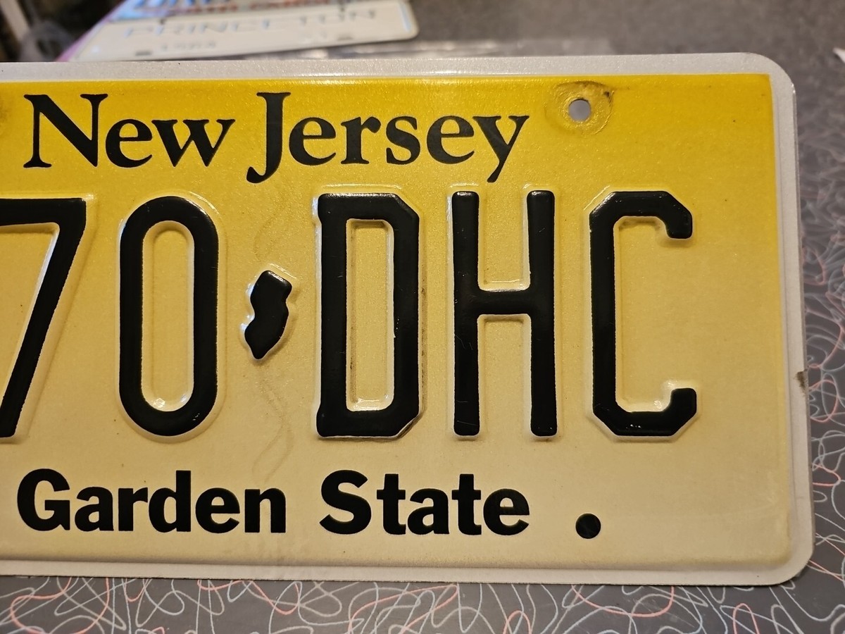 License Plate New Jersey Garden State T70-DHC Yellow Black Expired