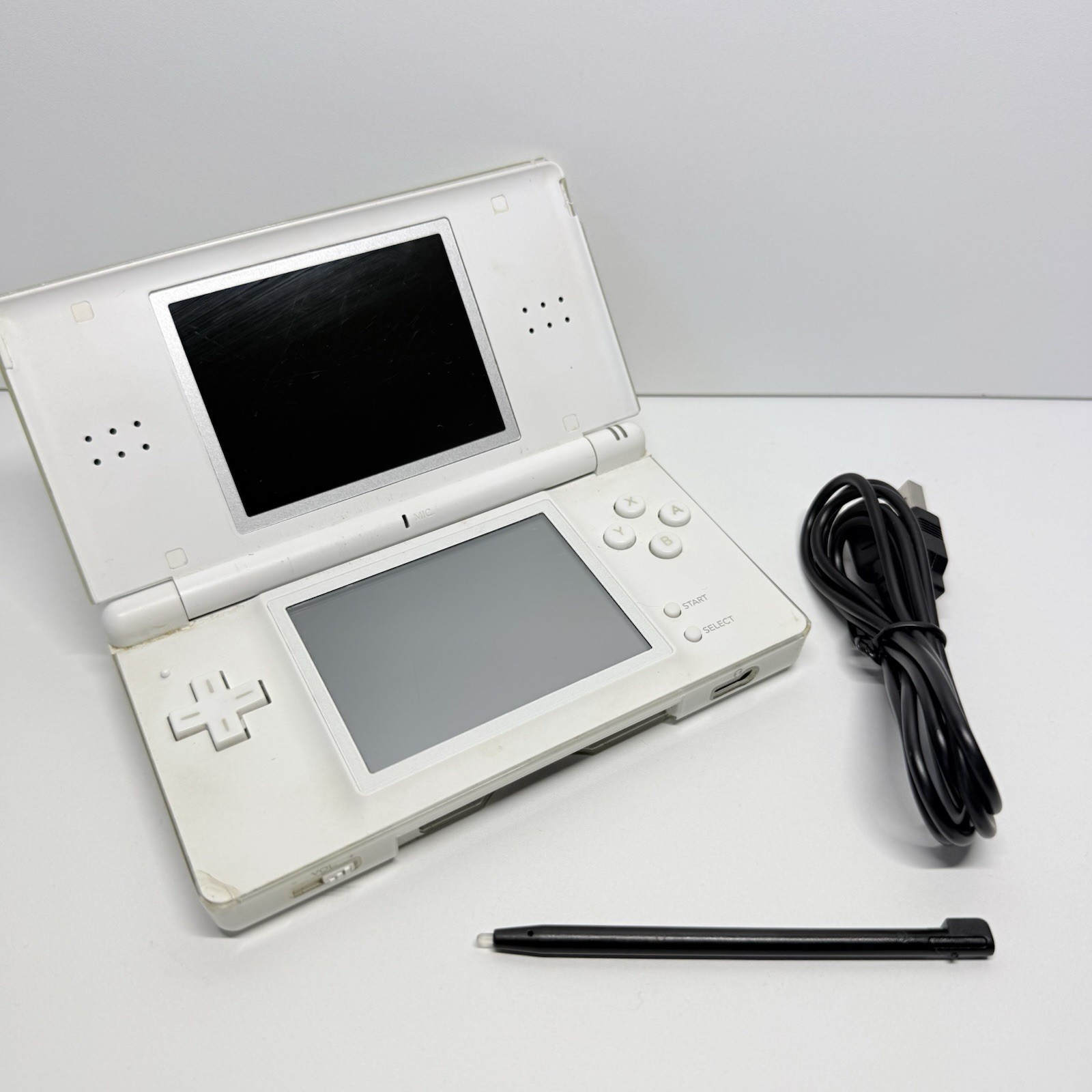 NINTENDO DS LITE BIANCO - ORIGINALE TESTATO E FUNZIONANTE + CARICATORE E PENNINO