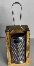 Small Wooden Box & Metal Food and Nut Grater. 7.25” T X 2.75” W X 2.25” D. In.