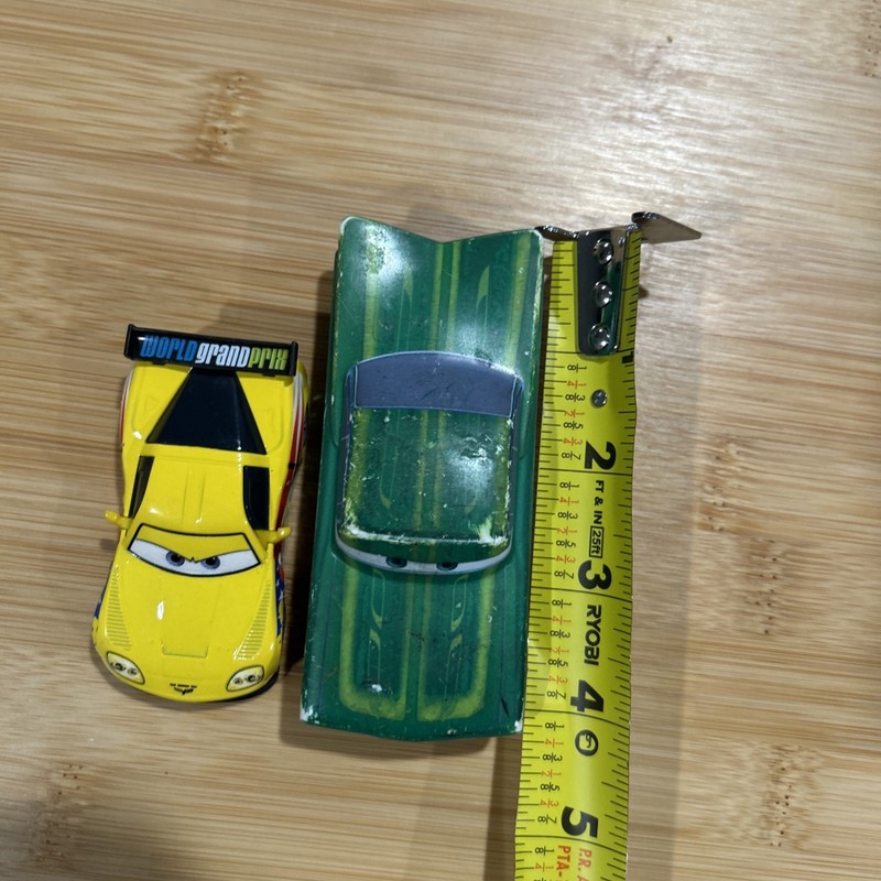 Set Of 2 Disney Pixar Cars 2 Yellow World Grand Prix Jeff Gorvette #24 + Ramone