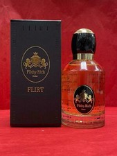 FLIRT de Filthy Rich Dubai EDP 3,4 OZ/100 ml (más 1 perfume sorpresa sin)