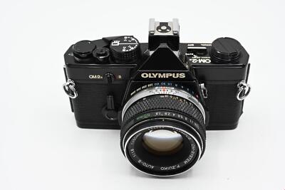 Olympus OM-2 OM-2n in Chrome or Black w/ optional 50mm f/1.8 Olympus OM-2 OM-2n in Chrome or Black w/ optional 50mm f/1.8