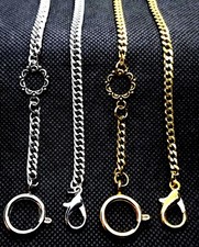 A Set Of Two Gold Plated and Silver Tone Ornate Pocket Watch Fob Chains