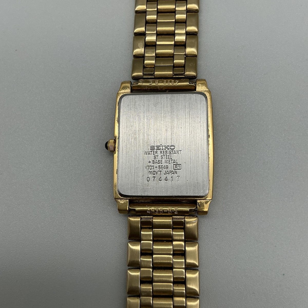 Seiko Mens Watch 25mm Black Textured Dial Gold Tone V701-5E49 New
