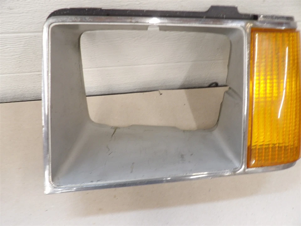 FORD ESCORT MERCURY LYNX 1981-1985 LH FARO LADO CONDUCTOR BISEL ARGENT/CROMO Foto 3 de 4