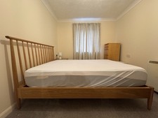 Ercol Teramo Double Bed Frame In Matt Oak Finish. NO MATTRESS