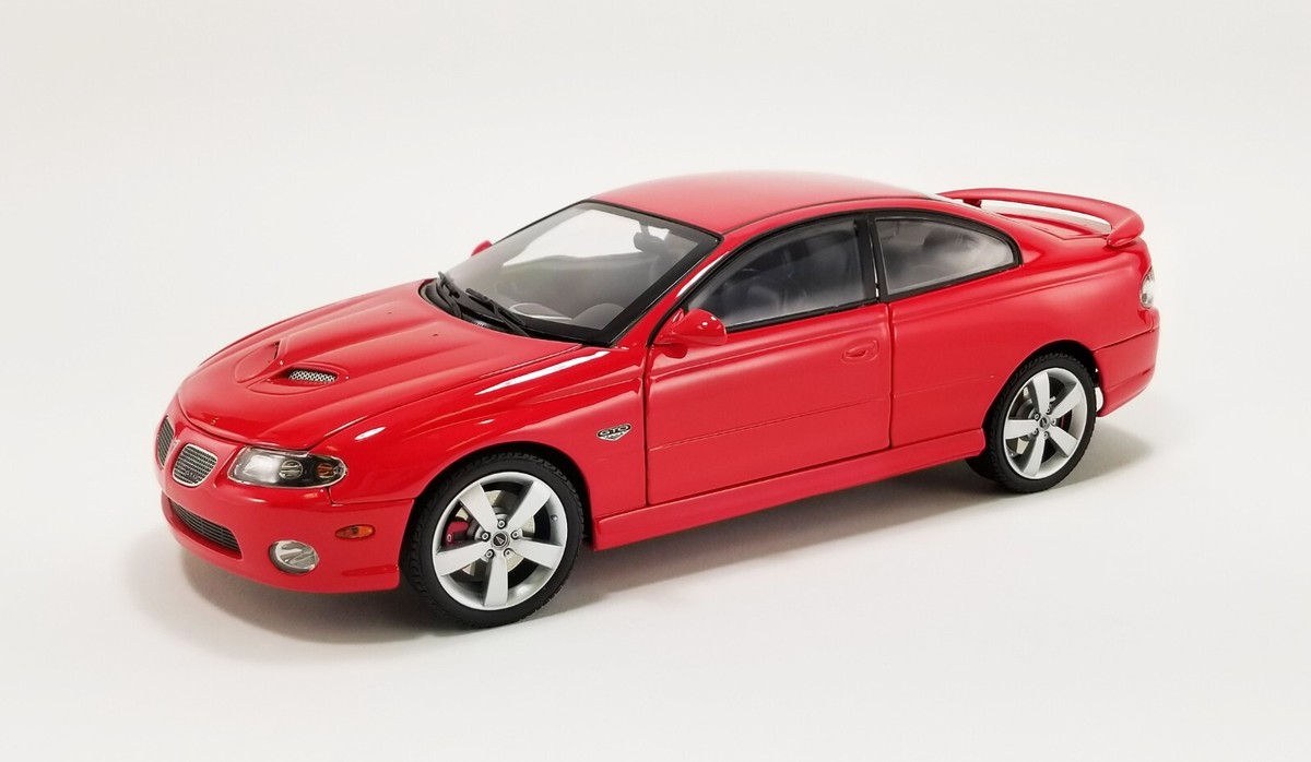 GMP ACME 1:18 2006 PONTIAC GTO TORRID RED WITH BLACK INTERIOR NEW