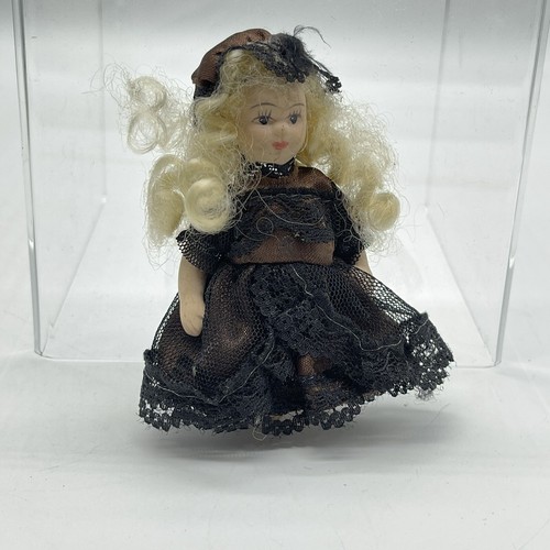 porcelain doll black dress