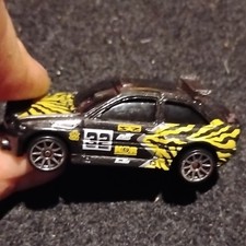 Hot Wheels Ford Escort Rally Black/Yellow Diecast 1:64 1996 Age 4+