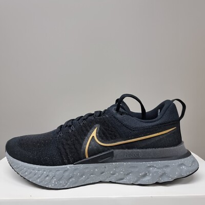 nike react black and gold