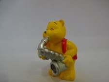 Spielfigur mit Musikinstrument / Gelbes Bärchen mit silbenen Saxophon