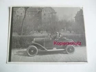 Original photo man and woman driving in convertible, car