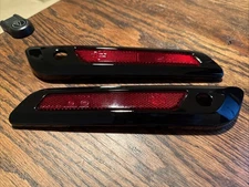 Harley Davidson Touring Black Saddlebag Latch Hinge Covers. OEM Vivid Black.