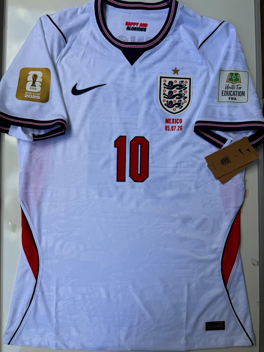 Preços baixos em Equipe Nacional Nike Inglaterra Branco Roupas e