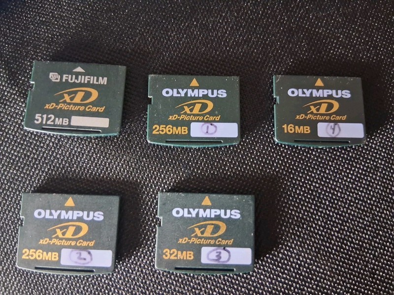 Five xD-Picture Cards: One 32mb Olympus and One  32mb and Two 256mb And One 512m