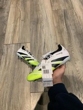 Image of White and green adidas predator elite FG j kids football boots