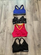 Women  s Lot Of 4 Sports Bras. Size Medium. Victoria  s Secret/Reebok/Champion.