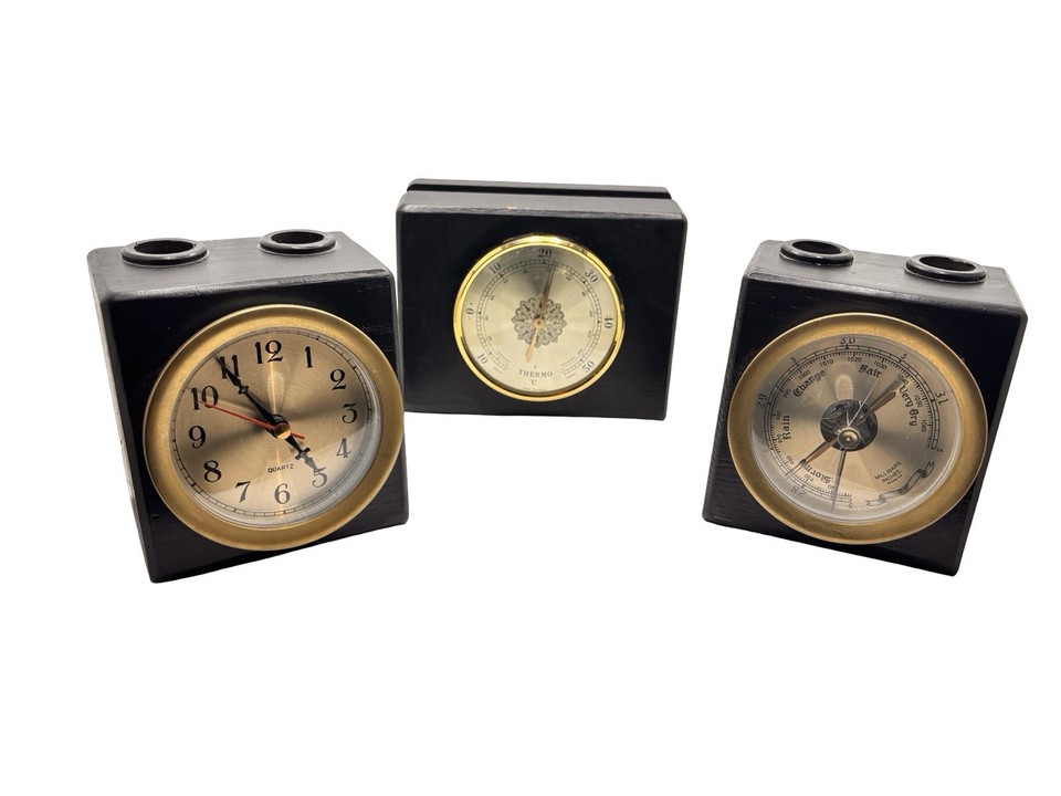 A 3-piece MCM desk set combining a clock, thermometer, AND barometer — a tiny analog weather station that belongs on a ship captain's desk or a mid-century exec's.