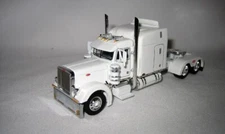 1/64 Cab DCP 543 379 Pete 63” Mid-Roof Sleeper (White) With Show Parts