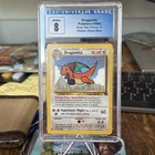 Dragonite #5 WB Stamped 1999 Mewtwo Strikes Back CGC 8