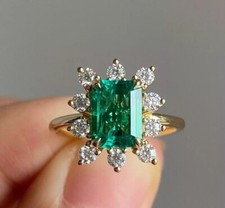 2 Ct Emerald Cut Simulated Emerald Women's Wedding Ring 14K Yellow Gold Plated