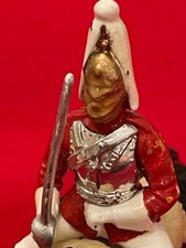 Vintage cast metal Royal gaurd mounted on horse with sword .W. Britian 3.5x3.5"