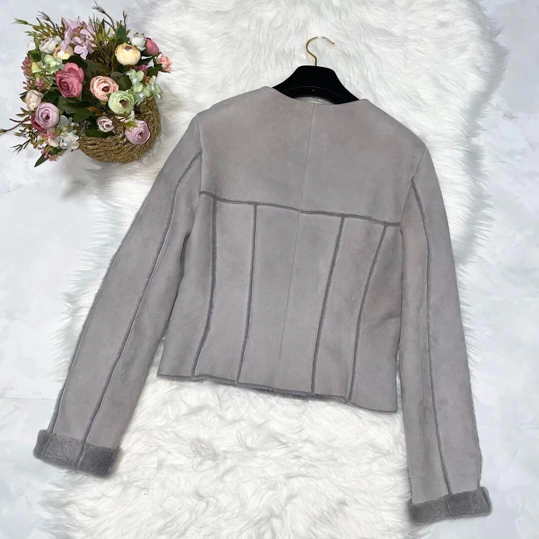 Giacca CHANEL vintage Mouton in pelle senza colletto taglia 40 grigia donna