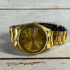 Vintage Seiko Men's Quartz Watch Gold Dial Day-Date Display 36mm