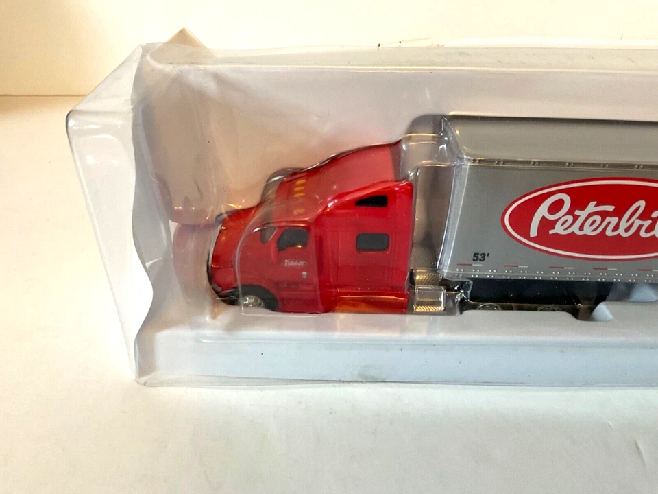 Peterbilt 387 Model Peterbilt Logo Tractor Trailer 1/64th Scale Speccast  #33516 - Image 3 of 4