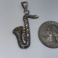 Vintage Sterling Saxophone Pendant