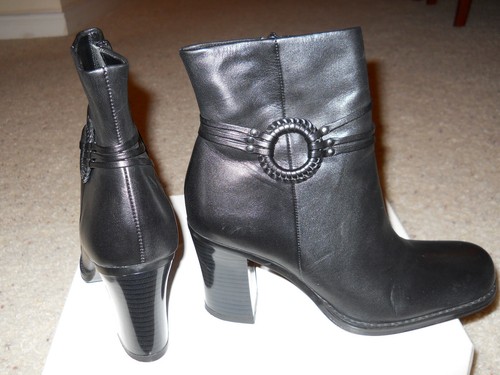 Ankle- high black leather boots, 3-inch heel. US Size 5-5.5. Excellent Condition