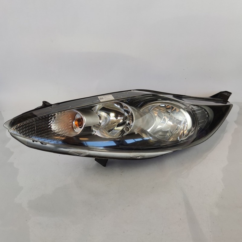 1734615 Proiettore SX FORD FIESTA (CB1) 1.2 16V (44Kw) Ber. 3p/b/1242cc