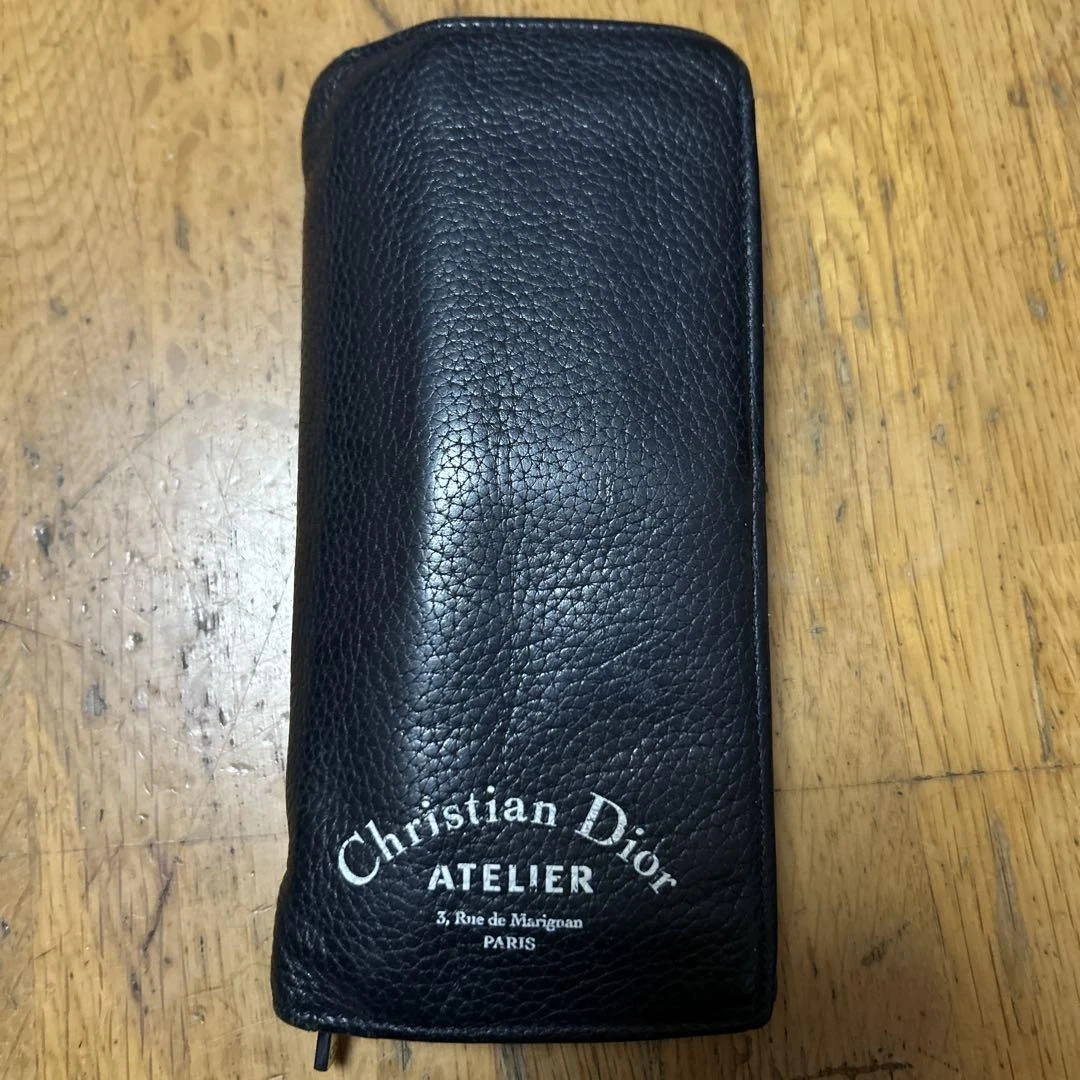 Portefeuille long Christian Dior cuir marine occasion 2018 achat usure légère