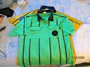 green referee shirt