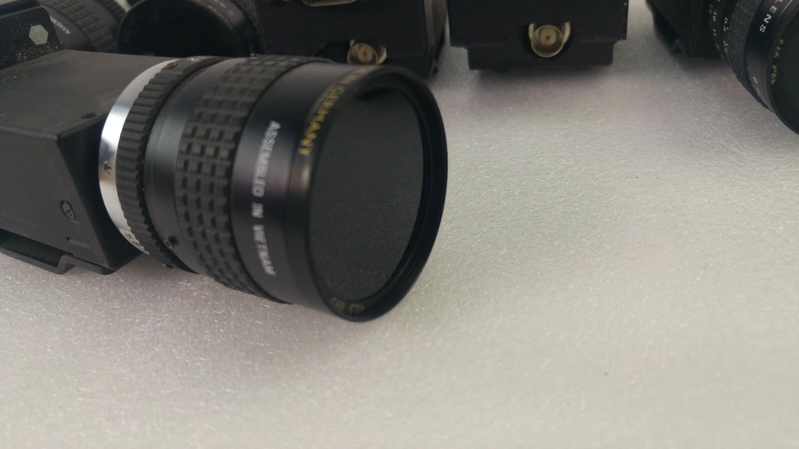 Lens front with filter ring marked Made in Germany, Assembled in Vietnam