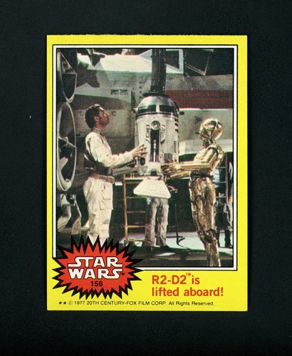 1977 Topps Star Wars #156 R2-D2 is lifted aboard!