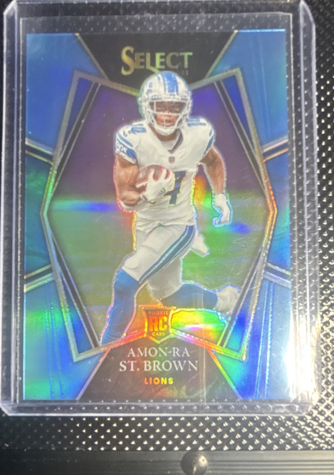 2021 Panini Select - Premier   Amon-Ra St. Brown #173 Light Blue Prizm /99 (RC)