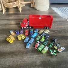 Disney Pixar Cars Mixed Lot of 31 Along with Truck Transporter Diecast Cars