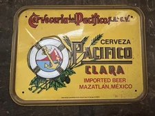 En Mazatlan Tomamos Cerv eza Pacifico Clara metal sign 8”x 11”