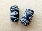 ANTIQUE 2 PCS TUBE SHAPE BLACK GLASS TRADE BEADS W/ WHITE ANIMAL PATTERN — photo 4
