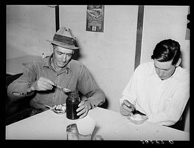 Photo:Farmers eating ice cream. Pie Town, New Mexico