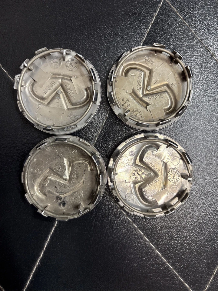 4 tapas centrales de llantas genuinas OEM INFINITI G35 M35 G37 Q60 Foto 2 de 4